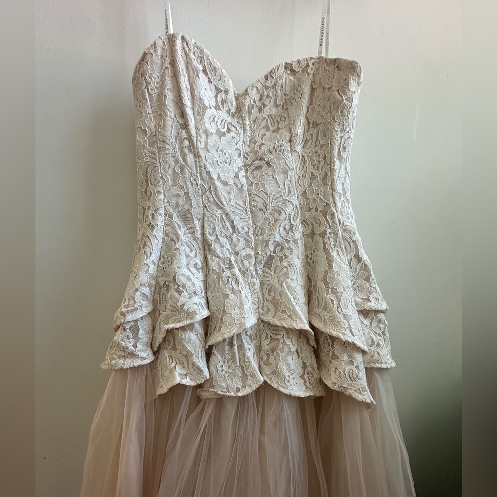 Masquerade Lace and Tulle Gown With Sweetheart Neckline And Peplum Waist
